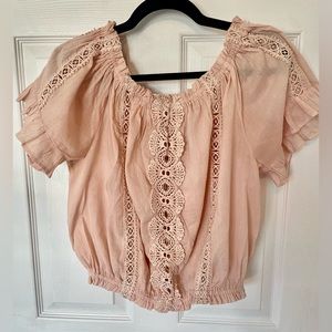 Light pink blouse, detailed design